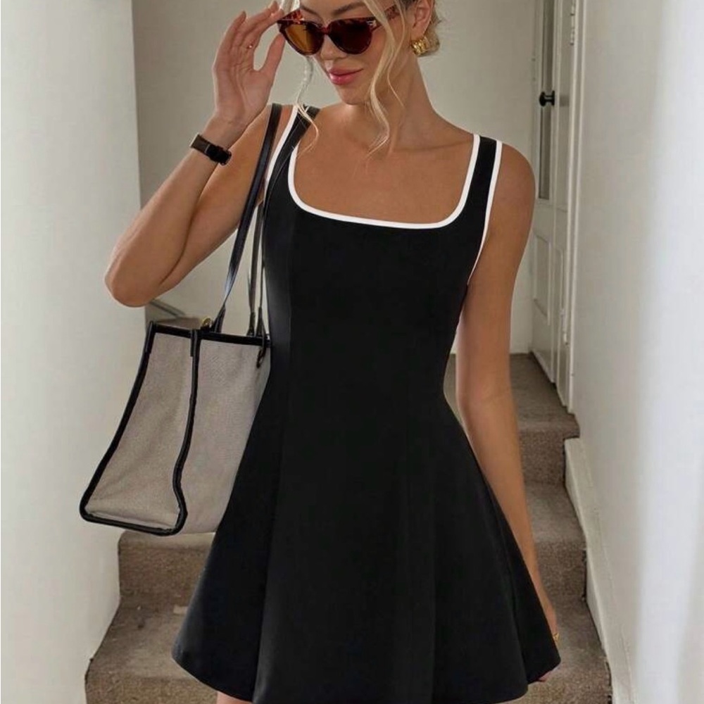Elegant Black Mini Dress with White Trim